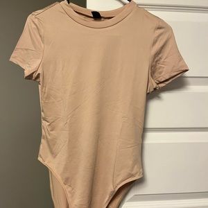 Brand new nude body suit